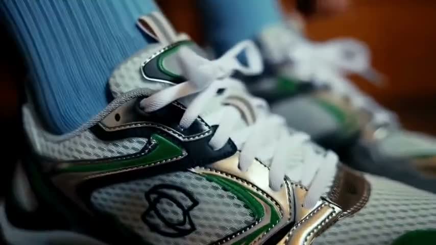 Still frame from Kling AI’s official sample: A product ad from reference images